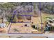 Expansive property featuring a house, outbuildings, trees, and a generous land area bordered in blue at 1902 Old Wilkesboro Rd, Statesville, NC 28625