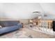 Attic bonus room features carpeted floors, a futon, and natural lighting at 1902 Old Wilkesboro Rd, Statesville, NC 28625