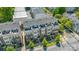 Aerial view of modern townhomes featuring rooftop patios, brick facade, and proximity to the neighborhood at 232 Parkwood Ave, Charlotte, NC 28206