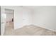 Bright bedroom with carpeted floors, neutral paint, two closets and natural light at 232 Parkwood Ave, Charlotte, NC 28206