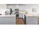 Modern kitchen featuring stainless steel appliances and granite countertops at 232 Parkwood Ave, Charlotte, NC 28206