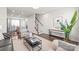 Spacious living room that showcases open floor plan with modern design and natural light at 232 Parkwood Ave, Charlotte, NC 28206