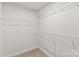 Organized walk-in closet equipped with multiple wire shelves providing ample storage space and a minimalist aesthetic at 232 Parkwood Ave, Charlotte, NC 28206