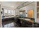 Large bathroom featuring double sinks, a soaking tub, shower, and views of the lake at 2700 River Ridge Pl, Fort Mill, SC 29708