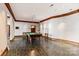 Spacious game room with pool table, slate floors and wood trim at 2700 River Ridge Pl, Fort Mill, SC 29708
