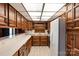 Kitchen featuring wood cabinets, double sink and white appliances at 2700 River Ridge Pl, Fort Mill, SC 29708