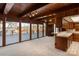 Living room with doors to deck overlooking the lake at 2700 River Ridge Pl, Fort Mill, SC 29708