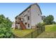 Exterior view of the home showcasing the backyard, deck, and covered patio at 2864 Park Ridge Blvd, Rock Hill, SC 29732