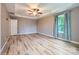 Bright main bedroom with hardwood floors, tray ceiling, and lots of natural light at 2864 Park Ridge Blvd, Rock Hill, SC 29732