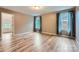 Large bedroom features wood floors, two large windows, and neutral paint at 2864 Park Ridge Blvd, Rock Hill, SC 29732