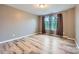Bedroom featuring hardwood floors, a window, and closet at 2864 Park Ridge Blvd, Rock Hill, SC 29732