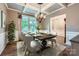 Beautiful dining room with elegant chandelier, a large window, and views into the house at 2864 Park Ridge Blvd, Rock Hill, SC 29732