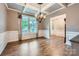Elegant dining room with coffered ceilings, hardwood floors, and large windows at 2864 Park Ridge Blvd, Rock Hill, SC 29732