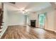 Spacious living room featuring a fireplace, hardwood floors, and abundant natural light at 2864 Park Ridge Blvd, Rock Hill, SC 29732