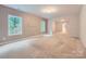 Expansive living room showcasing neutral carpet, natural light, and an open floor plan at 2864 Park Ridge Blvd, Rock Hill, SC 29732