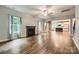 Spacious living room featuring a fireplace, hardwood floors, and abundant natural light at 2864 Park Ridge Blvd, Rock Hill, SC 29732