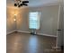 Bright bedroom featuring a ceiling fan, ample natural light, and neutral walls, creating a cozy atmosphere at 3186 Catawba St, Claremont, NC 28610