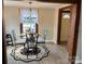 Dining room features a round table with four chairs, and plenty of sunlight at 3186 Catawba St, Claremont, NC 28610