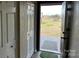 Entryway with view of backyard deck and shed at 3186 Catawba St, Claremont, NC 28610
