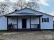 Quaint home exterior featuring a covered porch with ample seating at 3186 Catawba St, Claremont, NC 28610