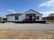 Charming home featuring white siding, a cozy porch, and a graveled front yard at 3186 Catawba St, Claremont, NC 28610