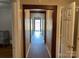 Hallway leads to an outdoor doorway at 3186 Catawba St, Claremont, NC 28610