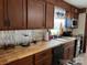 Kitchen features beautiful wood counters and stainless steel appliances at 3186 Catawba St, Claremont, NC 28610