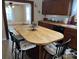 Kitchen island with seating and view into the dining area at 3186 Catawba St, Claremont, NC 28610
