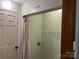 Laundry room with hanging curtain and wire rack shelf at 3186 Catawba St, Claremont, NC 28610