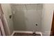Functional laundry room with modern flooring, utility connections, and space-saving wire shelving at 3186 Catawba St, Claremont, NC 28610