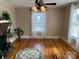 Bright living room with hardwood floors, ceiling fan, and lots of light at 3186 Catawba St, Claremont, NC 28610