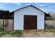 Outbuilding with double barn doors and lean-to at 3186 Catawba St, Claremont, NC 28610