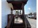 Covered porch with railing, stairs, and seating at 3186 Catawba St, Claremont, NC 28610