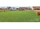Huge backyard featuring beautiful green space extending to the house with partial fence at 332 Shiloh S Rd, York, SC 29745