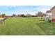 Expansive backyard offering an immense green space, partially enclosed by a fence at 332 Shiloh S Rd, York, SC 29745