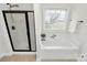 This bathroom features a soaking tub and a shower with a glass enclosure at 332 Shiloh S Rd, York, SC 29745