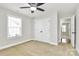Charming bedroom with large windows, a ceiling fan, and a convenient closet at 332 Shiloh S Rd, York, SC 29745