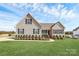 Charming home featuring tidy landscaping, complementing the light-colored exterior with black shutters at 332 Shiloh S Rd, York, SC 29745