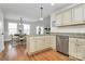 The kitchen features stainless steel appliances, granite countertops, and custom cabinetry at 332 Shiloh S Rd, York, SC 29745