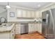 Modern kitchen features stainless steel appliances, granite countertops, and custom cabinetry at 332 Shiloh S Rd, York, SC 29745