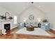 Spacious living room with vaulted ceilings, fireplace, and comfortable furniture at 332 Shiloh S Rd, York, SC 29745
