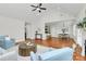 Inviting living room with vaulted ceilings, hardwood flooring, and open access to the kitchen at 332 Shiloh S Rd, York, SC 29745