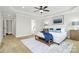 This main bedroom boasts a tray ceiling, plush carpet, and a decorative rug at 332 Shiloh S Rd, York, SC 29745