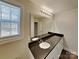 Bathroom featuring granite countertops, a large mirror, and ample lighting at 3608 Shadowcrest Dr, Concord, NC 28027