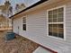 House exterior featuring vinyl siding, an HVAC system, and windows at 3608 Shadowcrest Dr, Concord, NC 28027