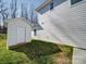 Backyard features a shed and well-maintained landscaping with green grass at 502 Geneva Cir, Gastonia, NC 28056