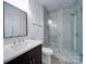 Bathroom featuring glass enclosed shower and modern vanity at 502 Geneva Cir, Gastonia, NC 28056