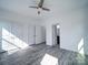 Spacious bedroom with ceiling fan and ensuite bathroom at 502 Geneva Cir, Gastonia, NC 28056