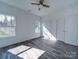 Bedroom features a ceiling fan and ample closet space at 502 Geneva Cir, Gastonia, NC 28056