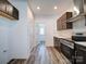 Kitchen features an open doorway that leads to the backyard at 502 Geneva Cir, Gastonia, NC 28056